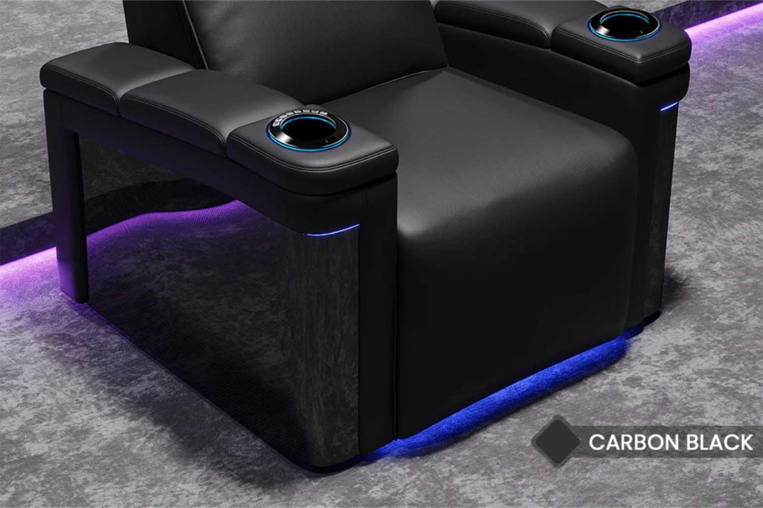 Underglow LED lighting accentuates the base of the chair for a luxurious ambiance in the Valencia Monza Pillow Top Carbon Fiber Home Theater Seating