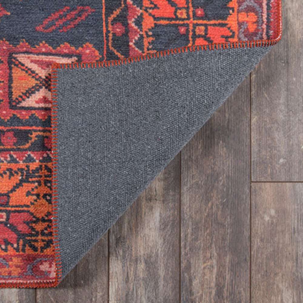 Underside of Momeni Afshar Indoor Rug - AFS16 Red highlights its durable backing
