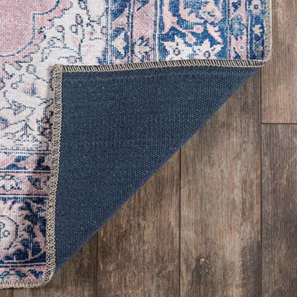 Underside of Momeni Afshar Indoor Rug - AFS30 Pink shows a sturdy backing that enhances durability and grip on hardwood floors