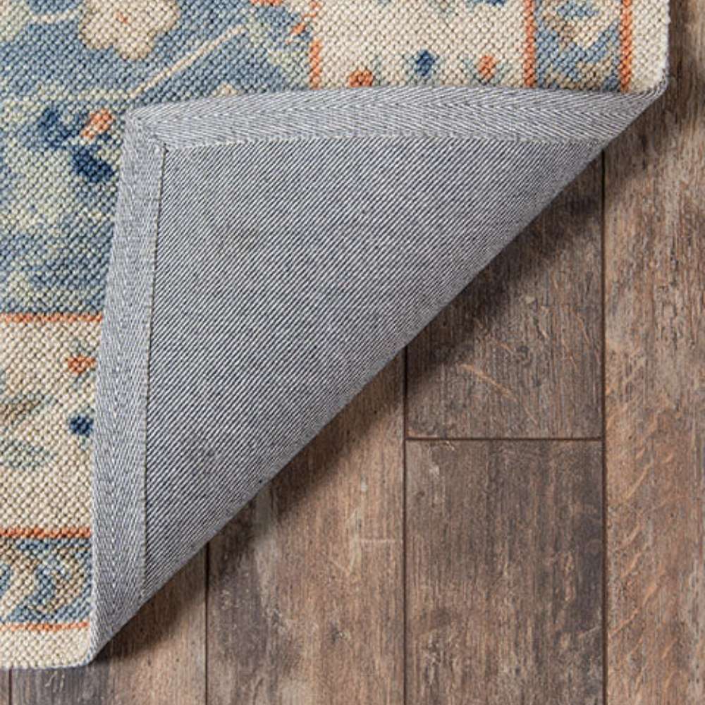 Underside of Momeni Anatolia Indoor Rug - ANA-8 Blue reveals its sturdy backing