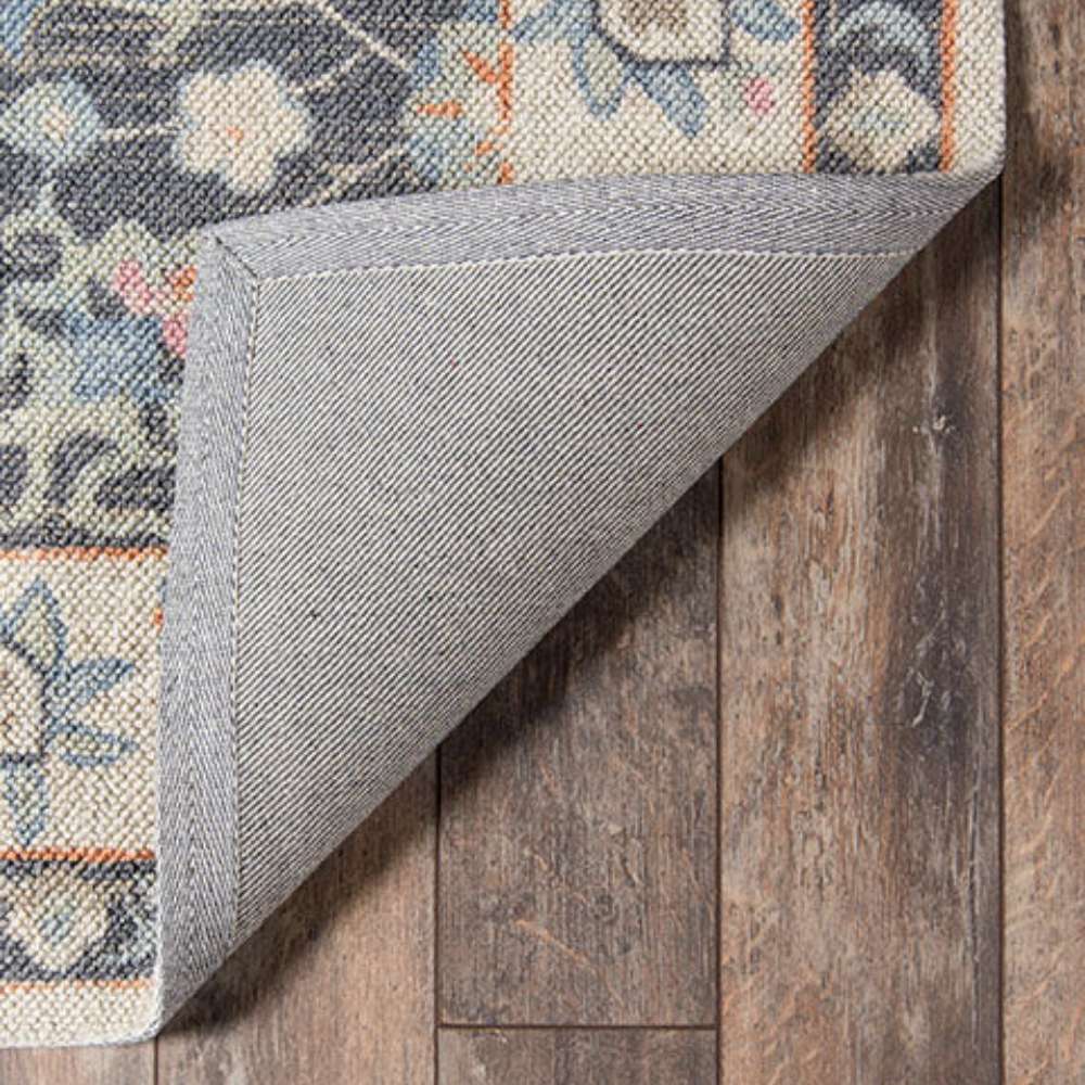 Underside of Momeni Anatolia Indoor Rug - ANA-8 Charcoal reveals a sturdy backing