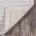 Underside of Momeni Andes Indoor Rug - AND-4 Light Grey shows its sturdy backing