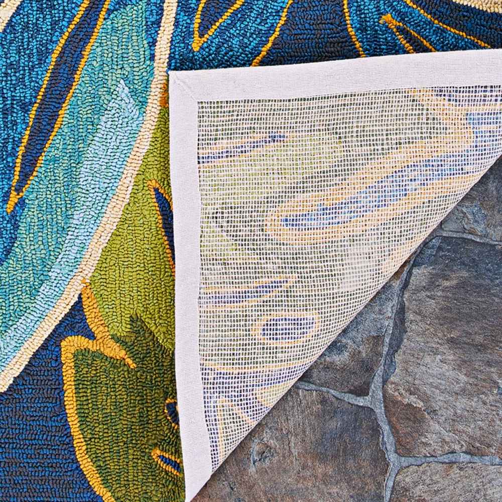 Underside of the Couristan Covington Indoor/Outdoor Rug - Areca Palms/Brown-Forest Green shows a durable mesh backing