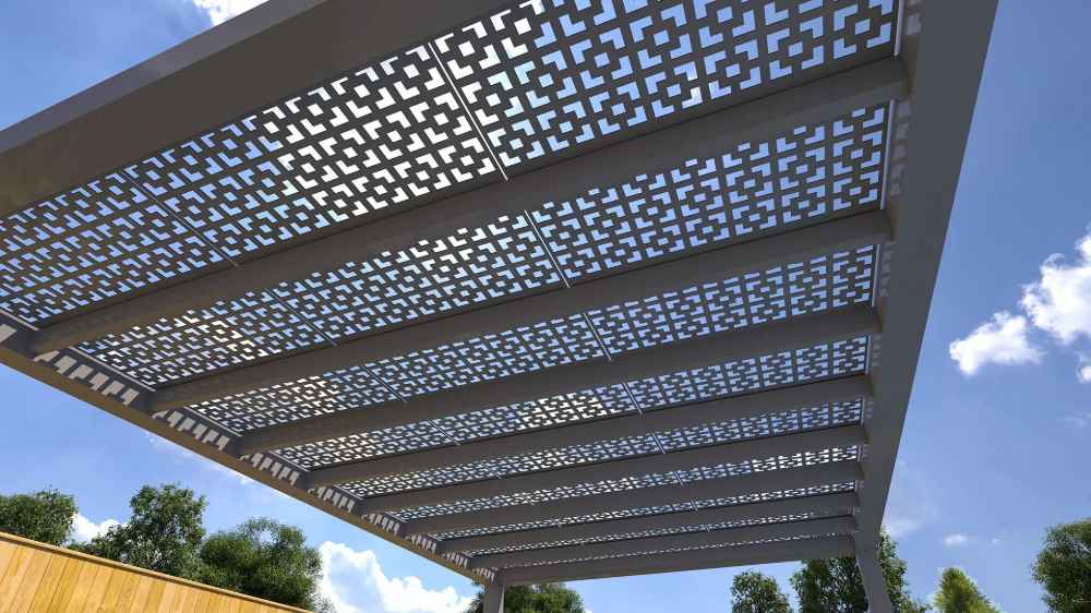 Up close, the angled slats and recessed lighting of a Structureworks Shadow Trex Pergola form a modern, dynamic canopy against the sky