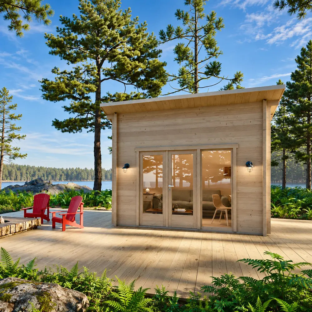 Front view of the Versa 107 70MM beside a lake in morning light, featuring broad glass panels, two exterior lamps, red chairs, and a pine forest.