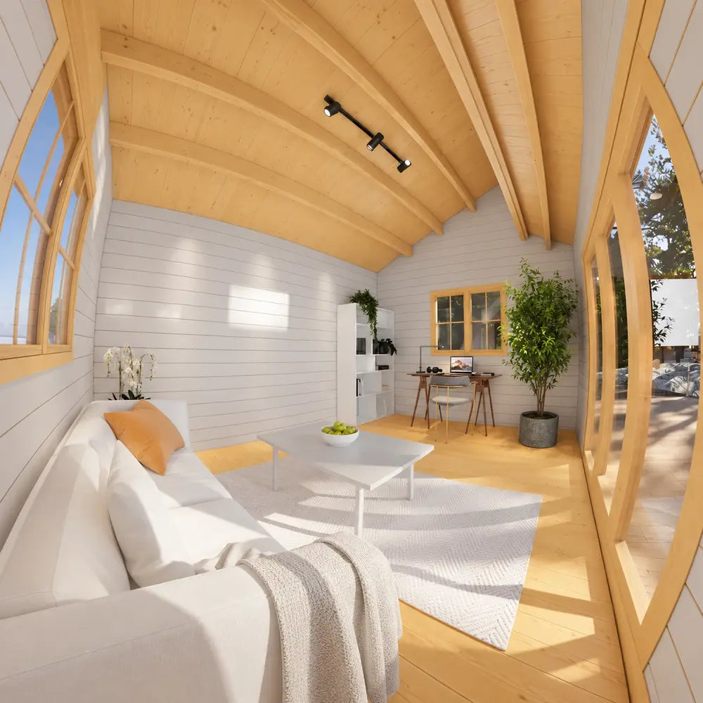 Bright Versa 160 Atrium 70MM lounge with a white sofa, orange pillow, coffee table, rug, workspace, bookcase, potted tree, and curved wooden ceiling.