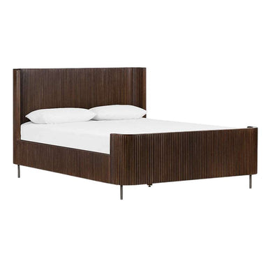Viewed from an angled perspective, Crate & Barrel Baylor Brown Ribbed Solid Oak Wood Queen Bed highlights its ribbed oak frame and clean modern design