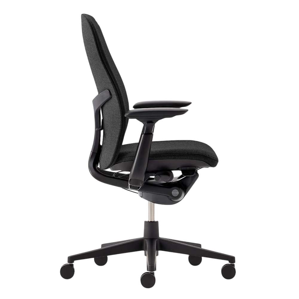 Viewed from the side, Crate & Barrel Haworth Zody Upholstered Charcoal Office Chair showcases its ergonomic profile, padded seat, and adjustable armrests