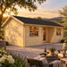 Wallis 44 Freedom Office shown from the front-left angle at golden hour in North Carolina’s Yadkin Valley, surrounded by vineyards, mature oaks and rustic fencing, with an upscale entertainment bar visible inside.