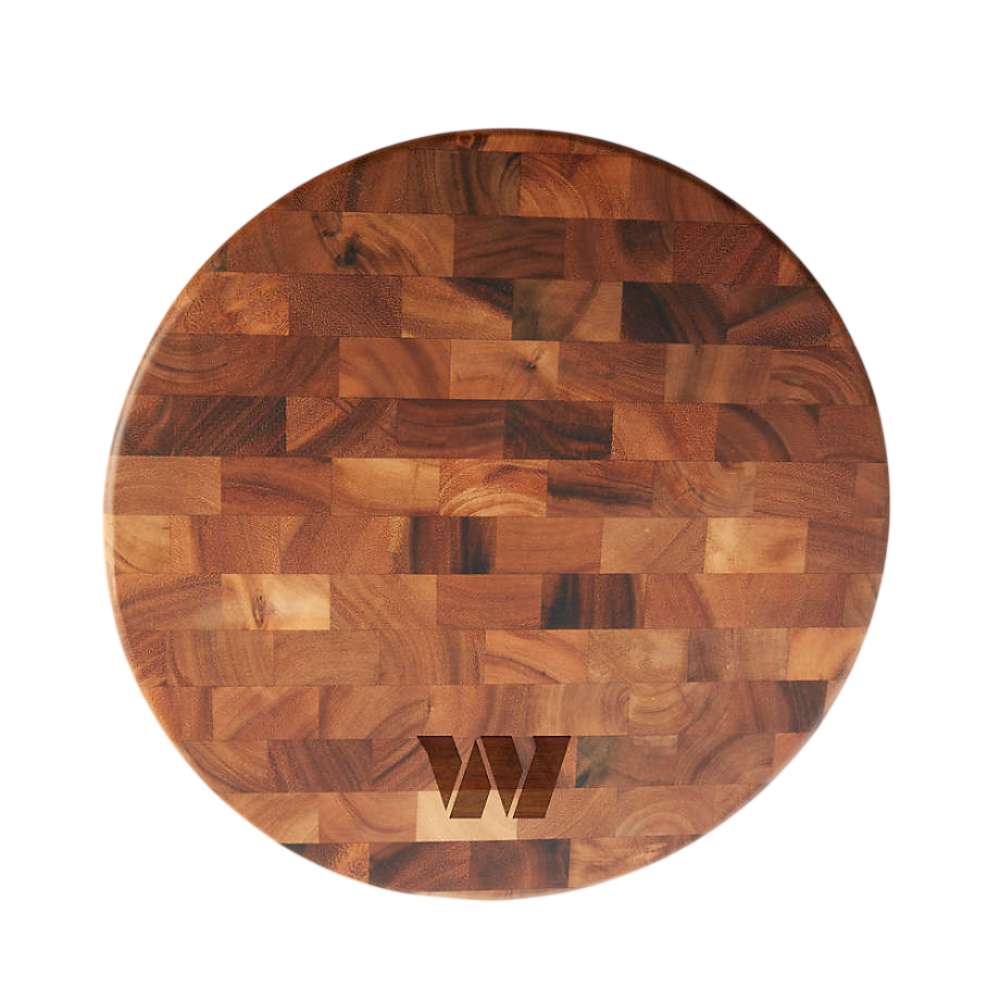 Washington Commanders Crate & Barrel NFL Round End Grain Cutting Board features a round wood-block design with the Commanders W logo near the bottom