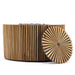 Westminster Teak Agora Fire Table is shown with its removable teak fire bowl cover leaning beside the round table