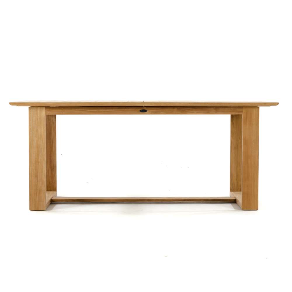 Westminster Teak Horizon 11pc Teak Dining Set is from the side with the table fully closed, displaying its clean rectangular shape and sturdy base