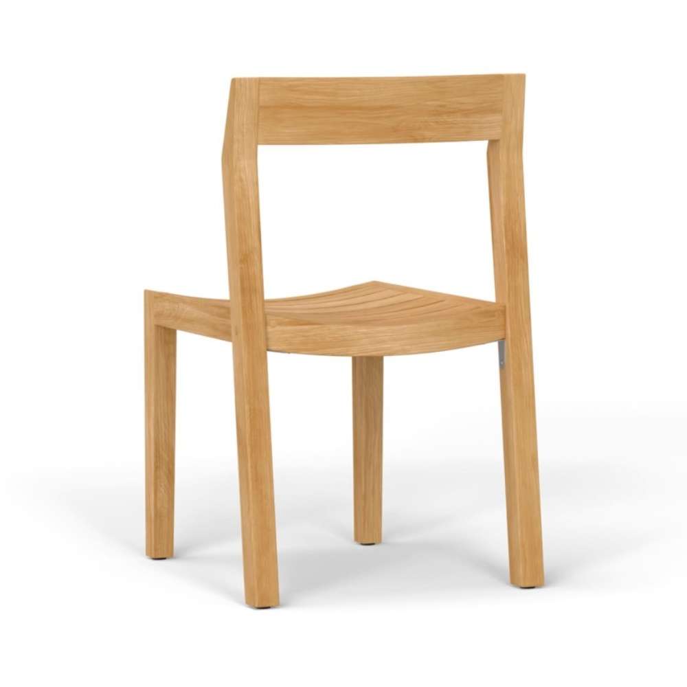 Westminster Teak Horizon Teak Side Chair is viewed from a slight angle, highlighting its gently curved seat and sturdy rectangular frame made of light-colored teak wood