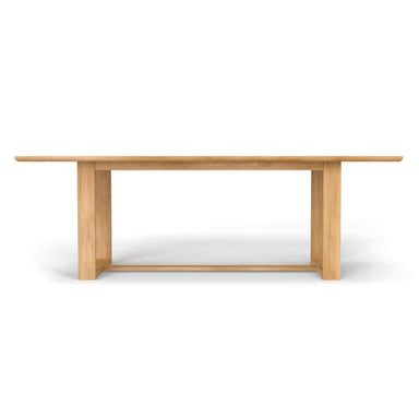 Westminster Teak Horizon Teak Table is displayed from the front, showing its wide surface and strong, minimalist base design