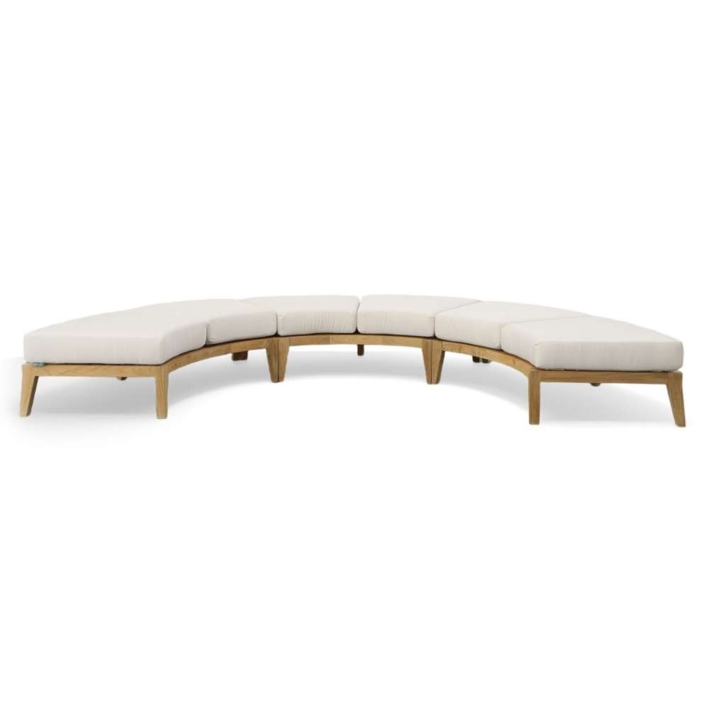 Westminster Teak Kafelonia Backless Sofa Sectional forms a long curved seating arrangement with multiple cushioned sections