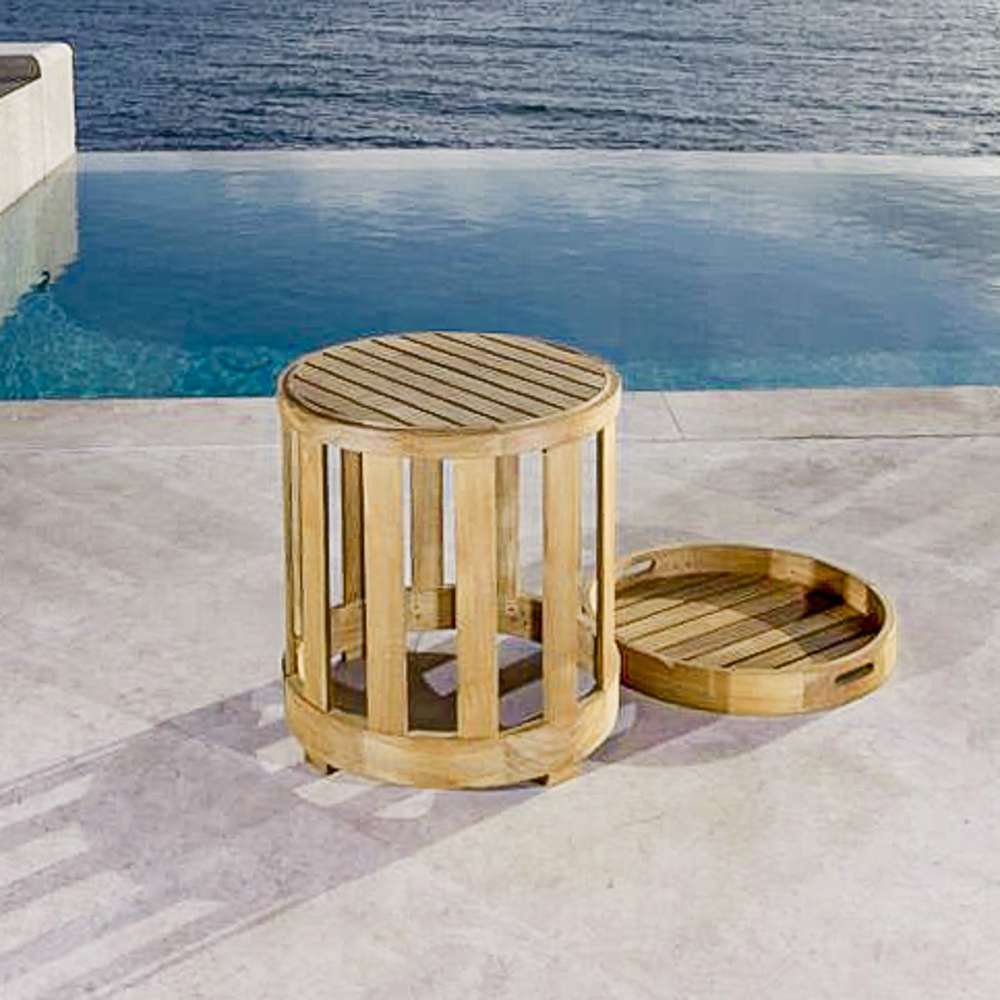 Westminster Teak Kafelonia Side Table with removable tray placed beside the base on a poolside patio