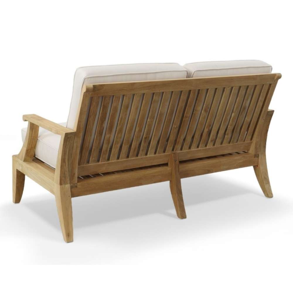 Westminster Teak Laguna Love Seat is shown at an angled back view, emphasizing its strong legs and slatted back design