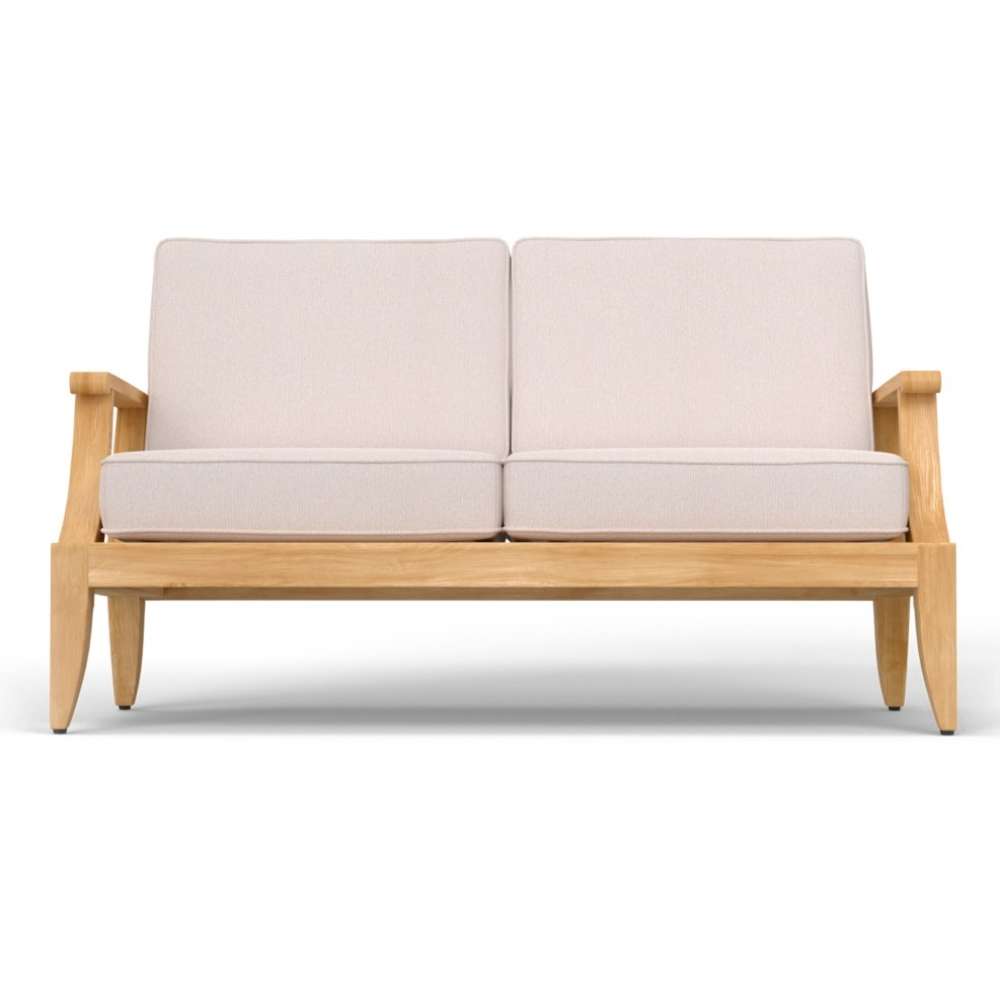 Westminster Teak Laguna Love Seat is shown from the front with a solid teak wood frame and two thick light-colored cushions