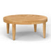 Westminster Teak Laguna Teak Coffee Table is a round wooden table with a slatted top and four sturdy legs, shown on a plain background