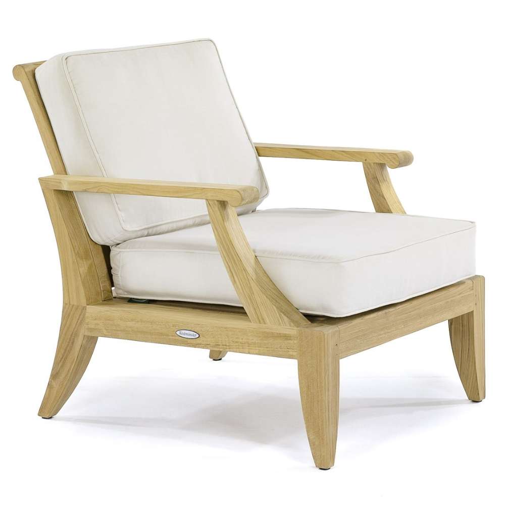Westminster Teak Laguna Teak Lounge Chair on a white background at an angle with thick white seat and back cushions and a solid teak frame
