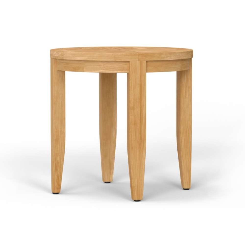 Westminster Teak Laguna Teak Side Table is displayed from a slightly different angle, highlighting its smooth circular edge and solid teak wood construction