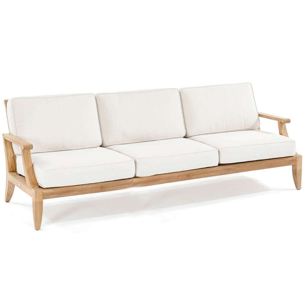 Westminster Teak Large Laguna Sofa with off-white cushions on a natural teak frame, shown angled on a white background