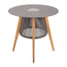 Westminster Teak Luna Small Table is a round table with a smooth circular top, angled wooden legs, and a central wire base