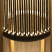 Westminster Teak Luna Standing Lamp features evenly spaced vertical ropes that softly glow as warm light shines through them from inside