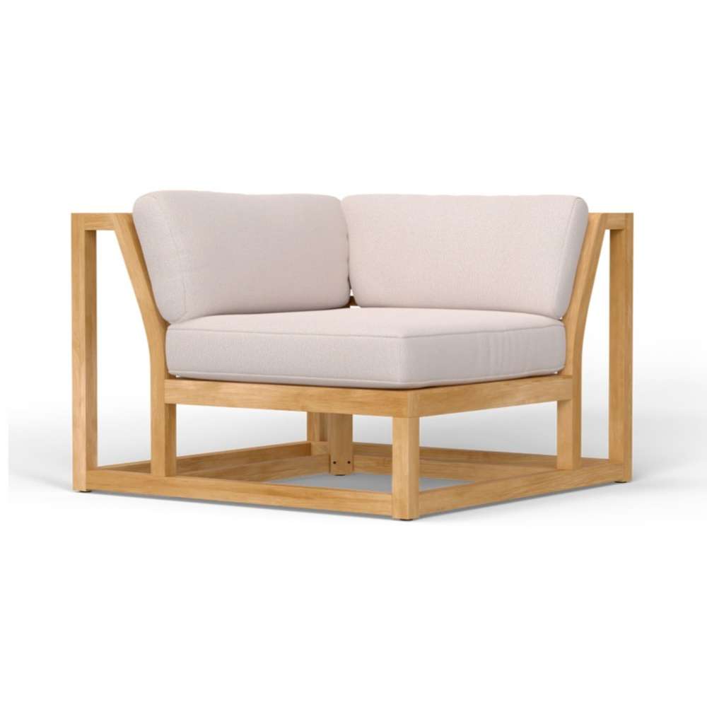 Westminster Teak Maya Corner Sectional features a clean teak wood frame with beige cushions, forming a compact corner seat with a modern, open-arm design