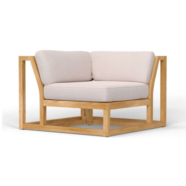 Westminster Teak Maya Corner Sectional features a clean teak wood frame with beige cushions, forming a compact corner seat with a modern, open-arm design