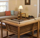 Westminster Teak Maya Corner Sectional is arranged with matching pieces in a living room, forming a cohesive seating set with slatted backs and soft cushions