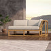 Westminster Teak Maya Left Side Sectional is placed indoors on a wooden floor near a plant, blending modern design with a natural setting