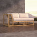 Westminster Teak Maya Right Side Sectional on a wood deck with soft cushions and a scenic outdoor backdrop