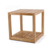 Westminster Teak Maya Teak Side Table is pictured from above as part of a matching outdoor lounge set, placed in front of seating and topped with a bowl of green apples