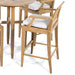 Westminster Teak Somerset Backless Bar Stool with white cushions beside a matching teak table
