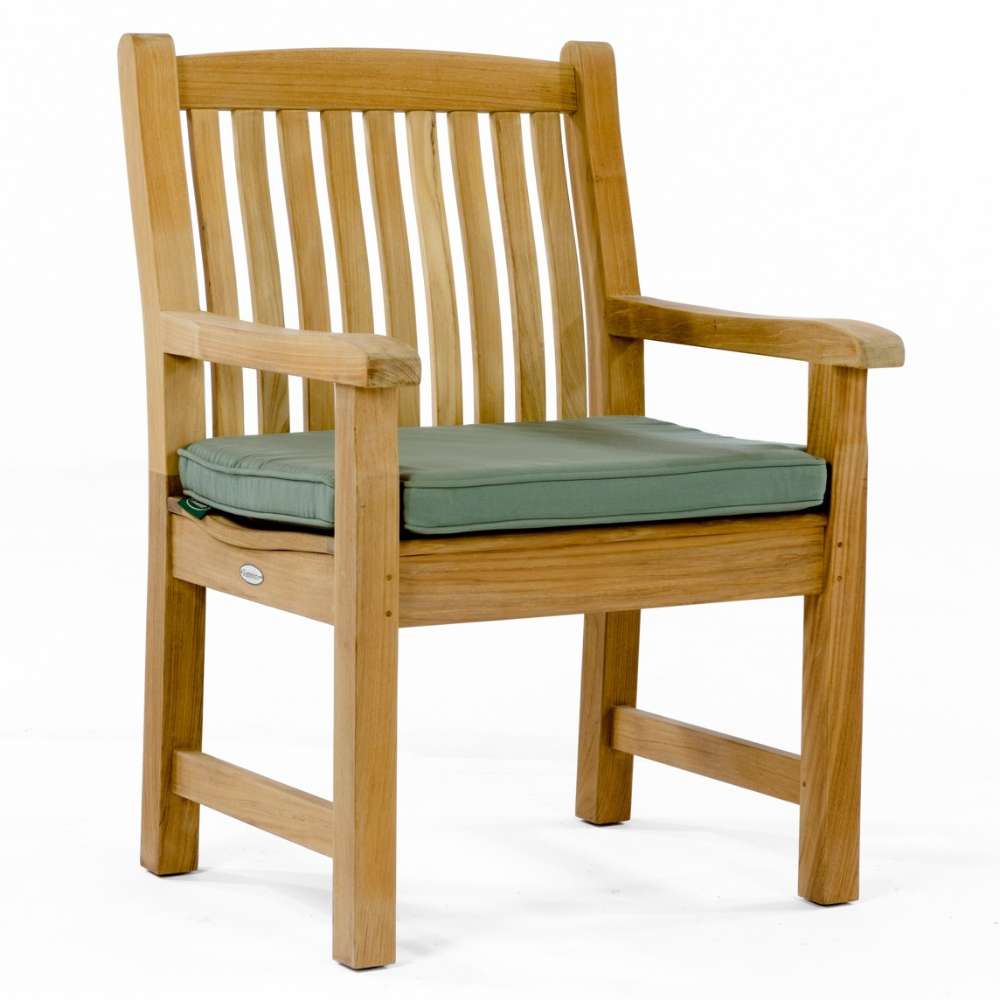 Westminster Teak Veranda 11pc Teak Dining Set teak armchair with wide armrests and a plush green cushion for added comfort