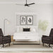 White Inovabed Wall Bed shown open in a living room between two dark armchairs