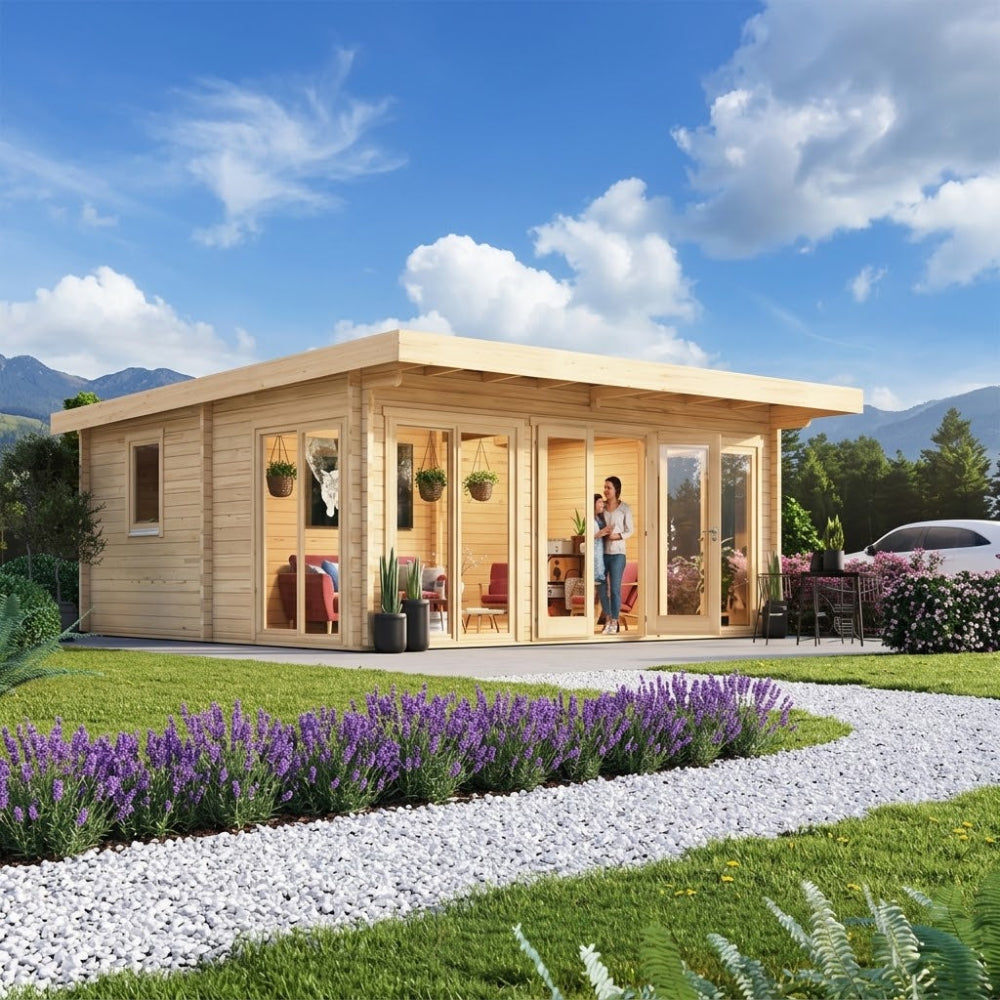 A wide-angle view of the GardenHouse24 USA Taunus 70 Garden Room shows it placed in a green lawn with modern furnishings inside and flower beds around