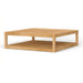 Wide angled shot shows Westminster Teak Maya Teak Coffee Table with its flat top surface and open rectangular base design