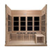 With the front wall removed, Golden Designs Catalonia 8 Person Near Zero EMF Far IR Sauna reveals dark carbon heating panels, slatted backrests and a portable bench