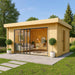 With large glass doors and a cozy interior, this inviting GardenHouse24 USA ALU Concept 70I Garden Room sits beautifully in a green backyard