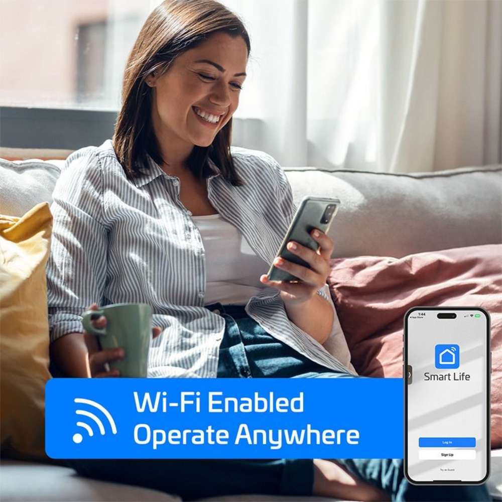 Woman on a couch adjusting settings in a smartphone app shows the Wi-Fi control of the ACiQ 18000 BTU Essentials 22 SEER2 2 Zone Wall Mount Mini Split Heat Pump System