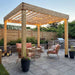 Wooden pergola over a patio with chairs and a grill using the Outdoor Living Today Western Red Cedar Urban Escape Pergola
