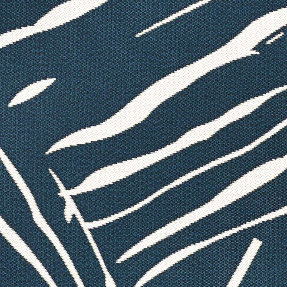 Zoomed-in detail reveals the ivory palm-like lines woven across the dark ink background of Couristan Dolce Indoor/Outdoor Rug - Parquet/Ink