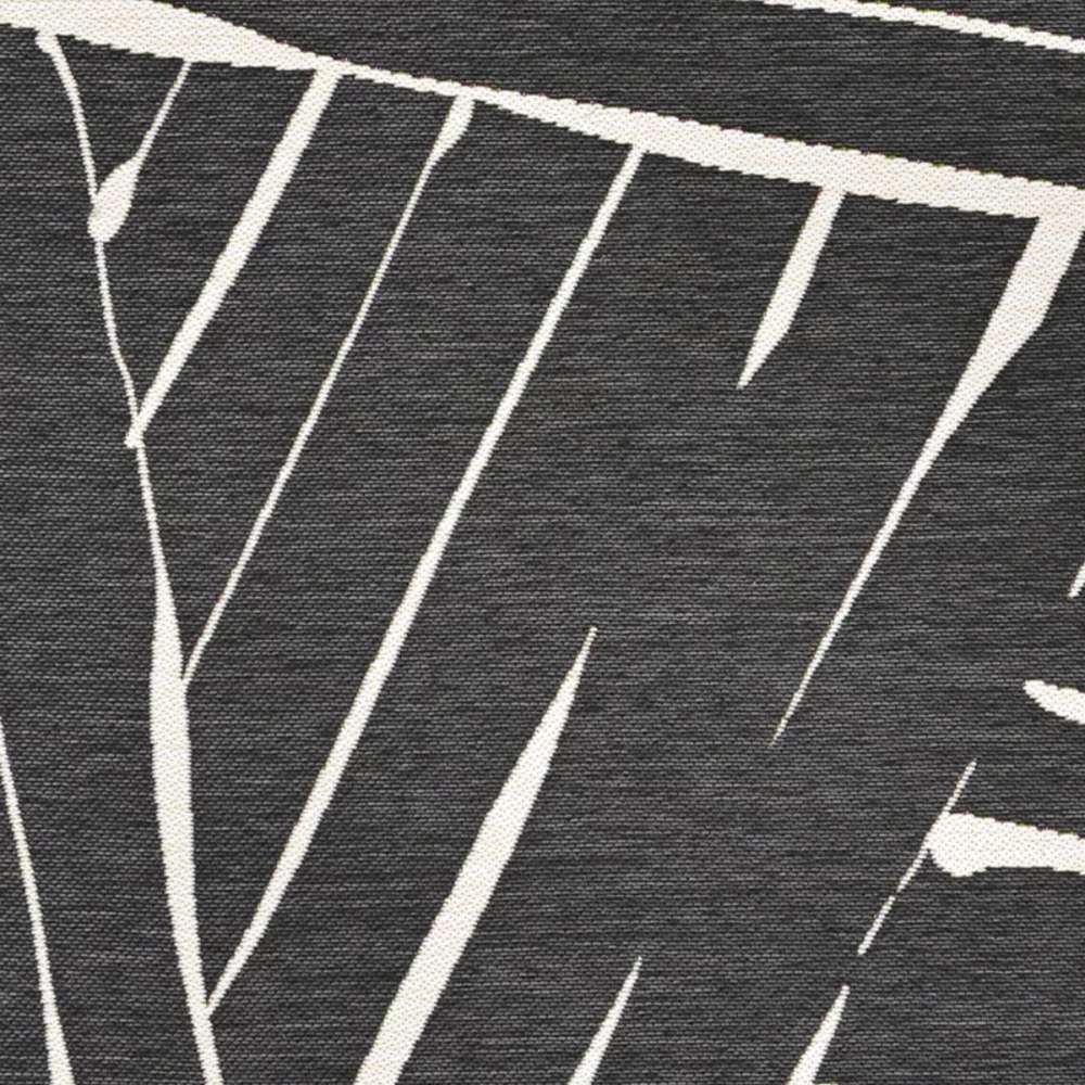Zoomed-in view of Couristan Dolce Indoor/Outdoor Rug - Parquet/Charcoal reveals the intricate white-on-charcoal geometric lines