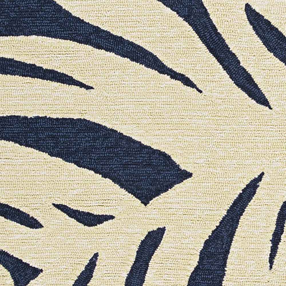 Zoomed-in shot of the Couristan Covington Indoor/Outdoor Rug - Palms/Navy shows the raised loop texture and high-contrast design
