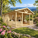 Angled view of the Nepean 44A professional home office surrounded by rhododendrons, hardwood trees, and layered Blue Ridge Mountains near Asheville, North Carolina.