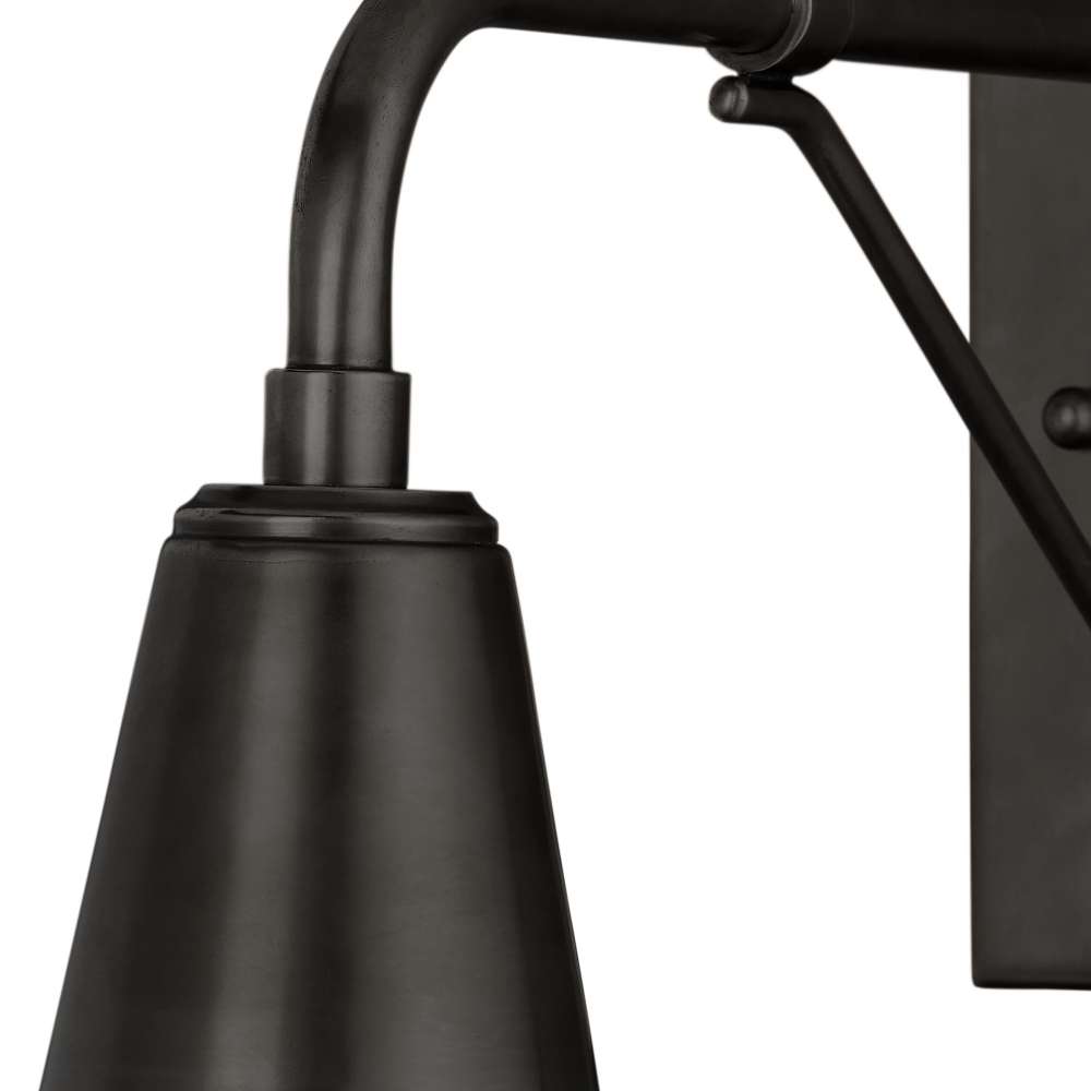 Black Crate & Barrel Mariner Outdoor Wall Sconce mounted on an exterior wall casting warm downward light