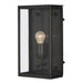 Black Crate & Barrel Royster Black Outdoor Wall Sconce in matte black solid brass with a single E26 socket behind clear glass, shown in the second alternate view