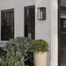 Black Crate & Barrel Royster Black Outdoor Wall Sconce in matte black solid brass with clear glass panes, rated for outdoor and bathroom use, shown in the fifth alternate view